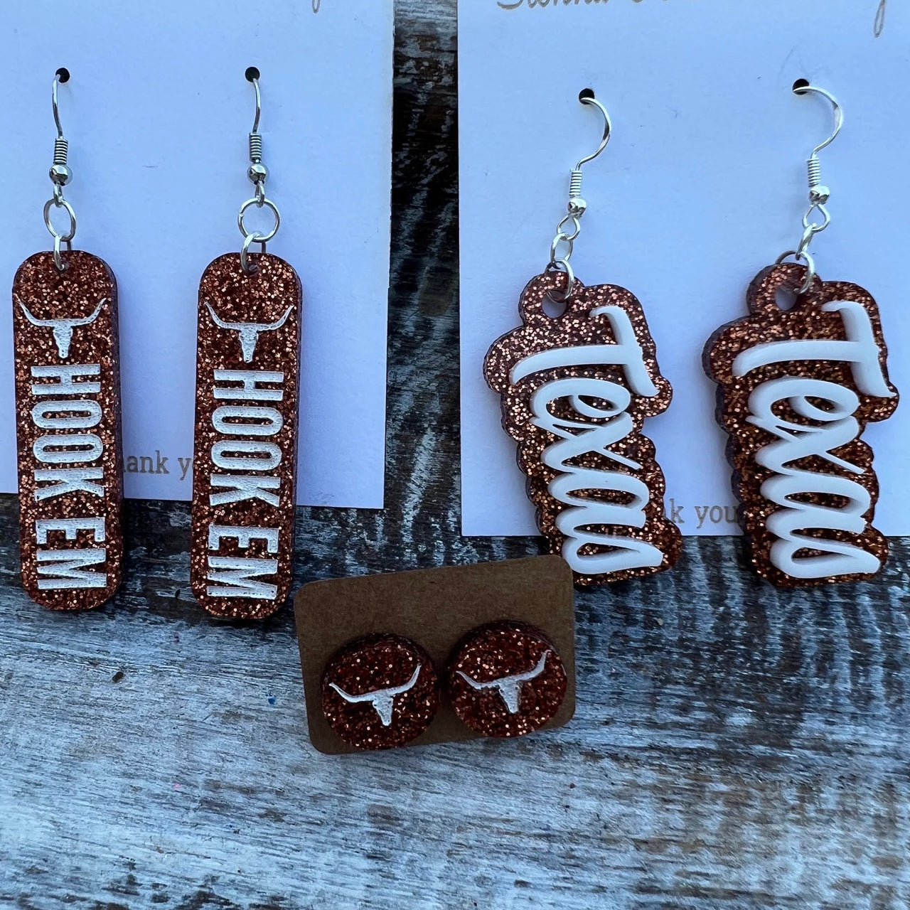 Hook Em Dangly Earrings