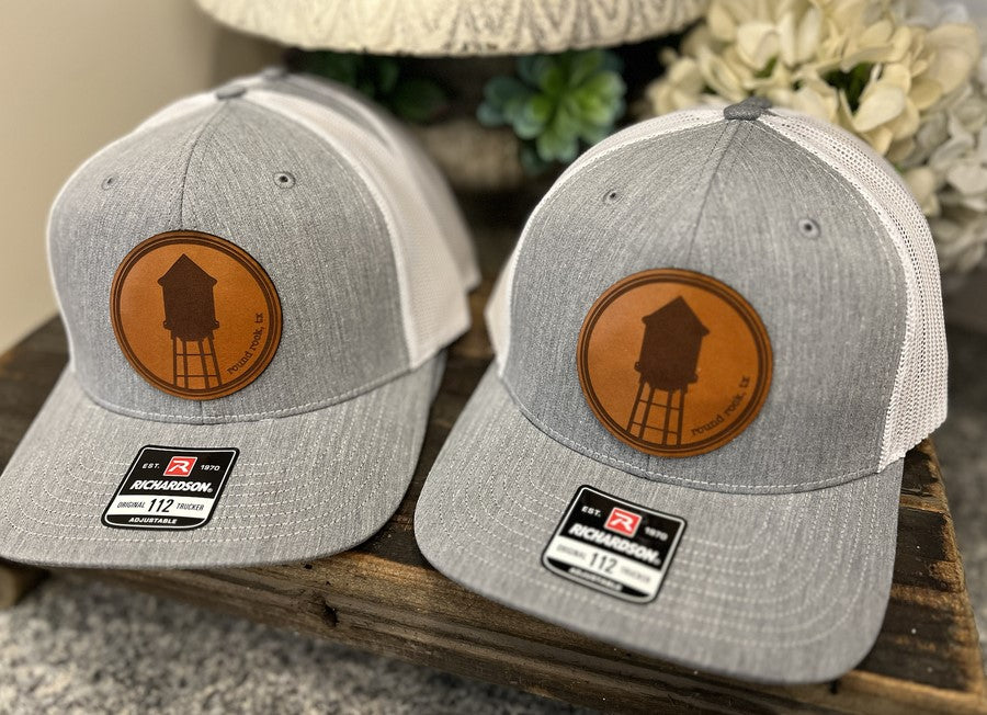 Trucker hat with custom leatherette patch